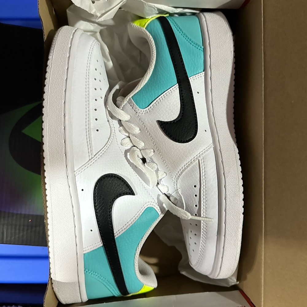 Nike Sneakers worn one time slightly used.